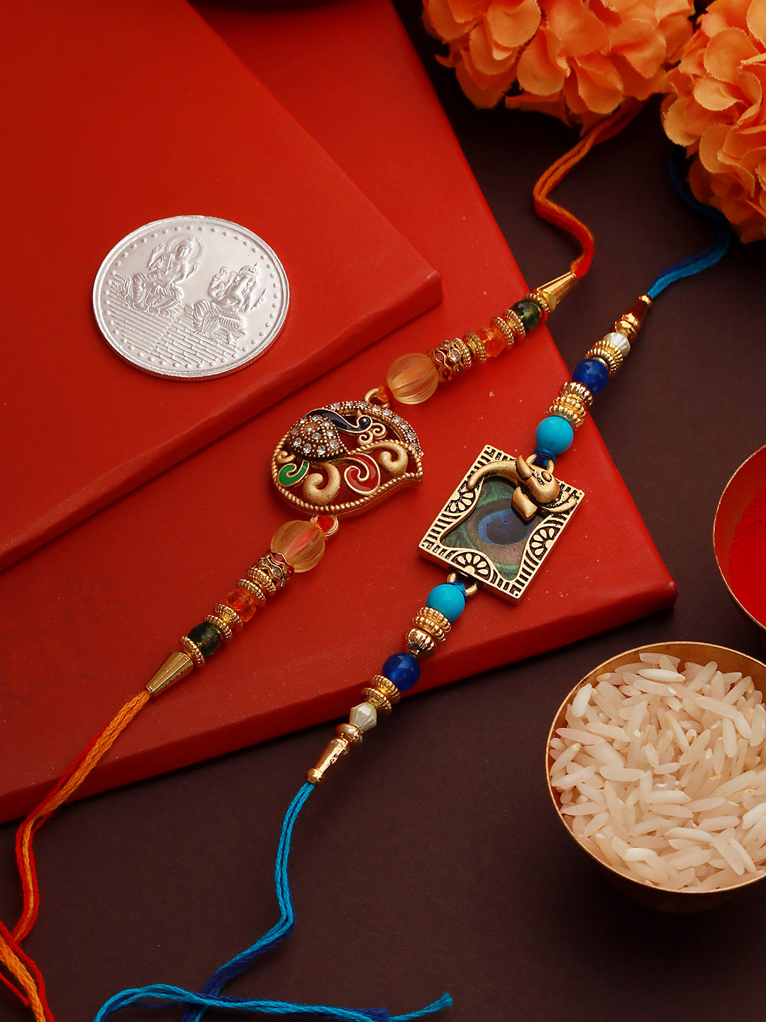 Set of 2 Kundan Studded Peacock Shaped Rakhi with 10 gram Shri Laxmi round 999 Round Silver Coin