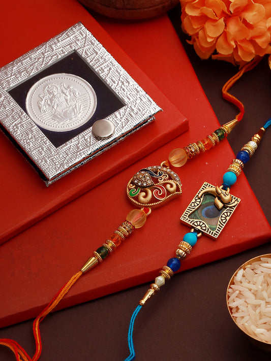 Set of 2 Kundan Studded Peacock Shaped Rakhi with 10 gram Laxmi Ganesh round 999 Round Silver Coin