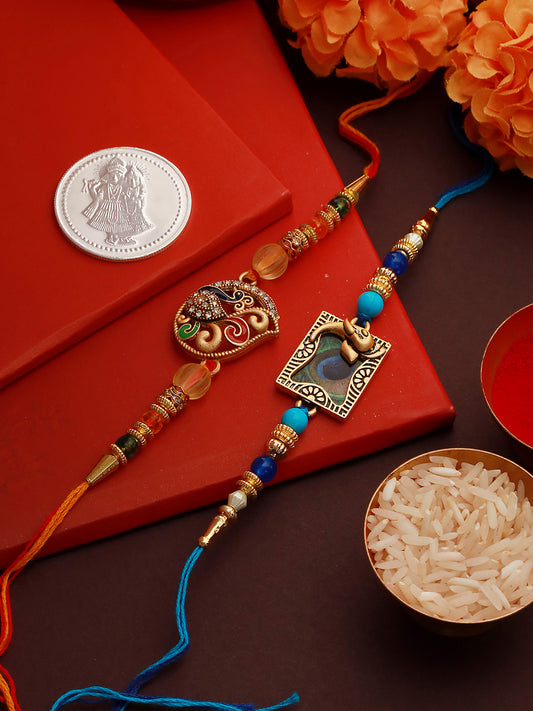 Set of 2 Kundan Studded Peacock Shaped Rakhi with 10 gram Radhe Krishna round 999 Round Silver Coin