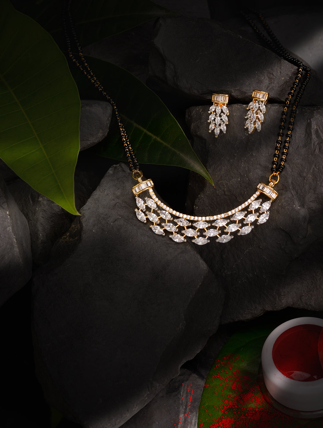 Gold Plated Black beads AD Studded Contemporary Mangalsutra Pendant and Earrings Set
