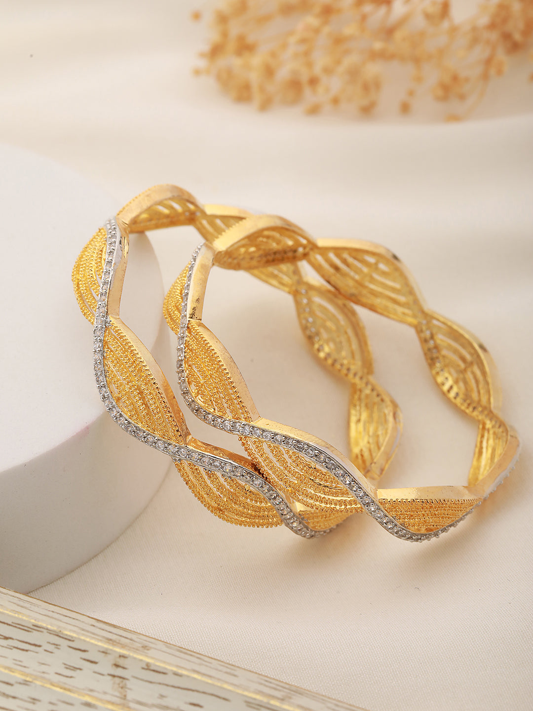 A Pair Of 2 Gold Dual  Toned AD Studded hand Crafted Bangles