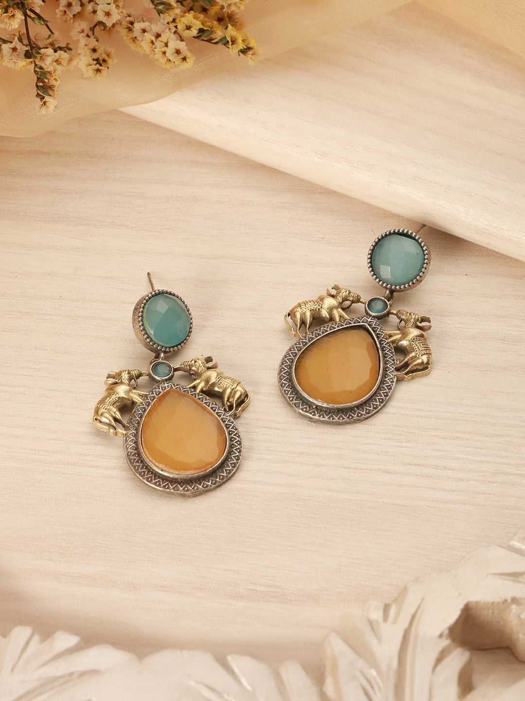 Silver Oxidised Yellow Stone Studded Bull Motif Statement Chandbali Earrings