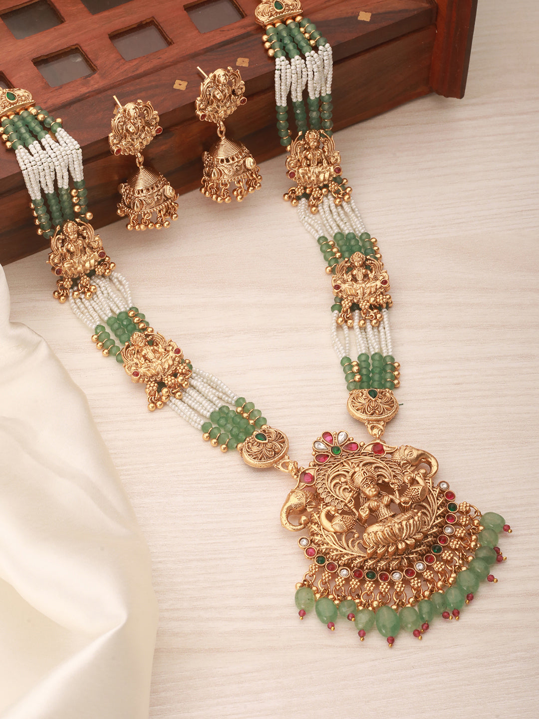 Gold Plated Green Pearl Beaded Lakshmi Motif Long haram Temple Jeellery Set