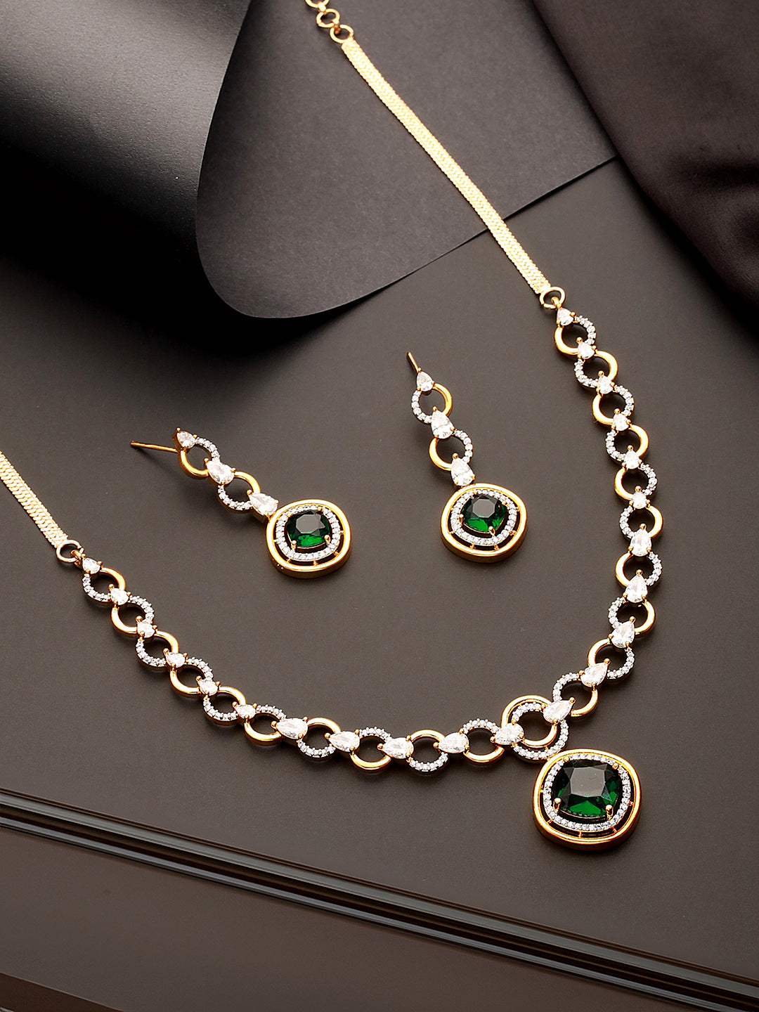 Gold Toned Emerald Green AD Studded Statement Link Pendant Jewellery Set