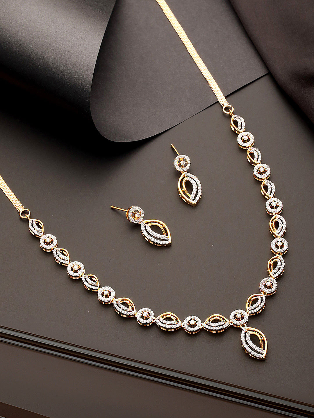 Gold Toned AD Studded Minimal Leaf Design Pendant Jewellery Set