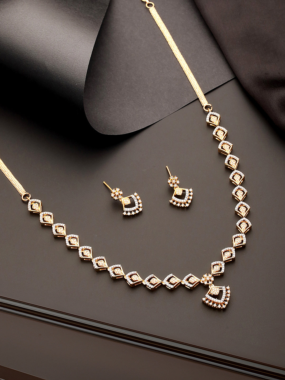 Gold Toned AD Studded Geometric Shaped Delicate Pendant Jewellery Set