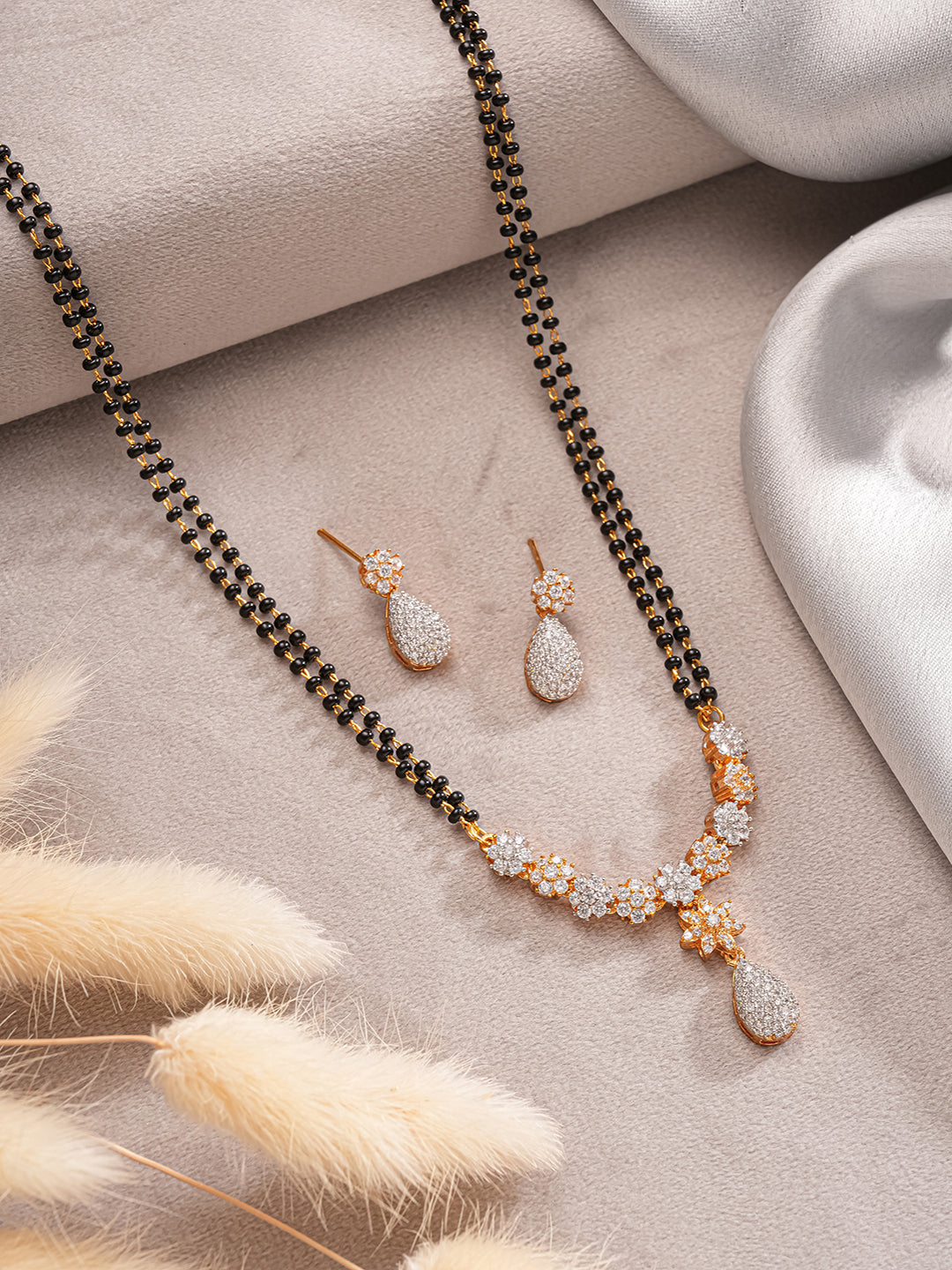 Gold Toned AD Studded Black Beads Studded  Designer Solitaire Type Mangalsutra Jewellery Set