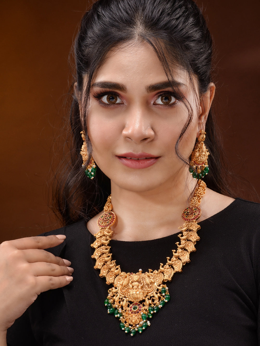 Gold Plated Multi stone studded Handcrafted Exquisite Lakshmi ji & Peaacock Design Temple Jewellery Set