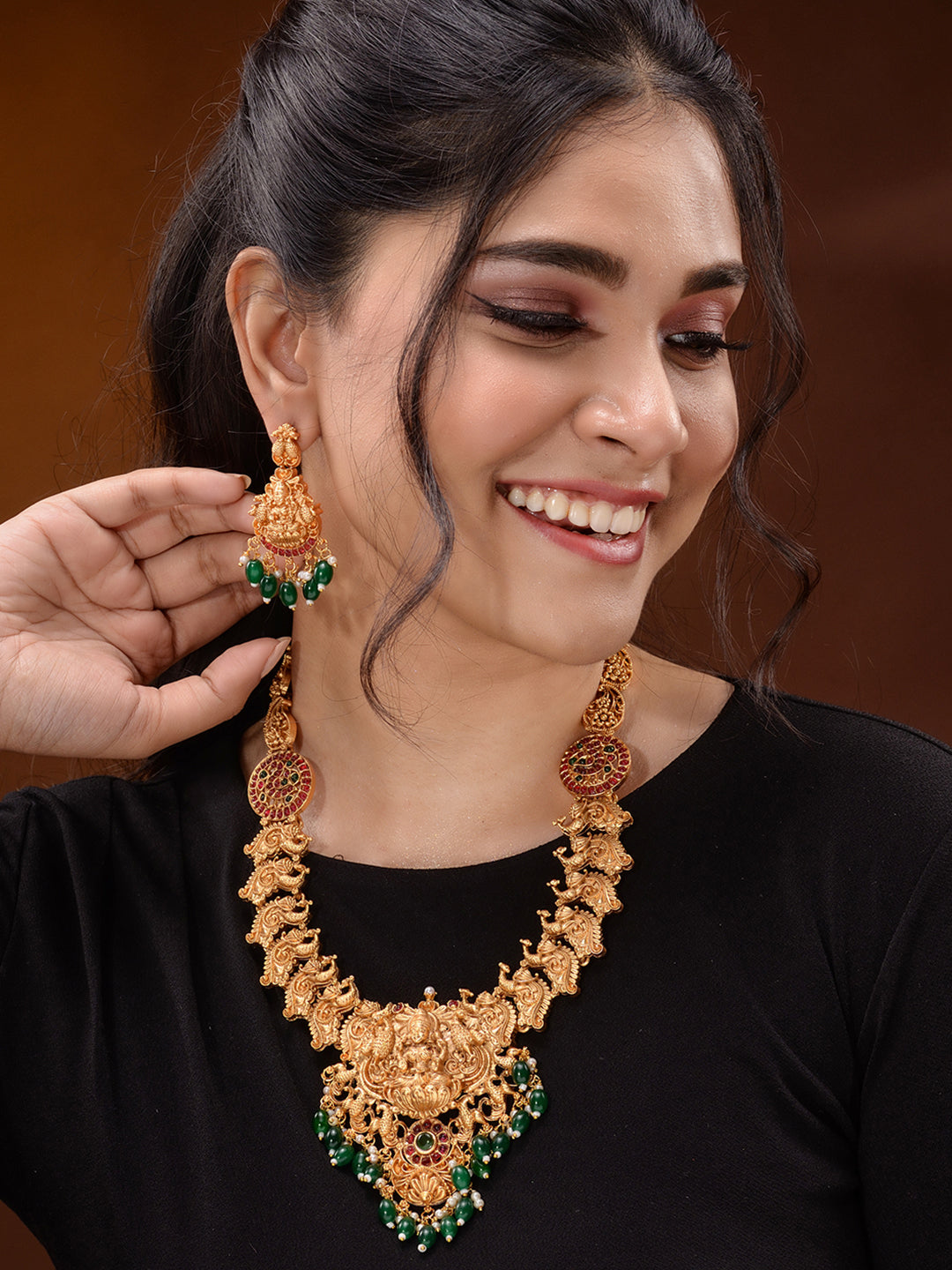 Gold Plated Multi stone studded Handcrafted Exquisite Lakshmi ji & Peaacock Design Temple Jewellery Set