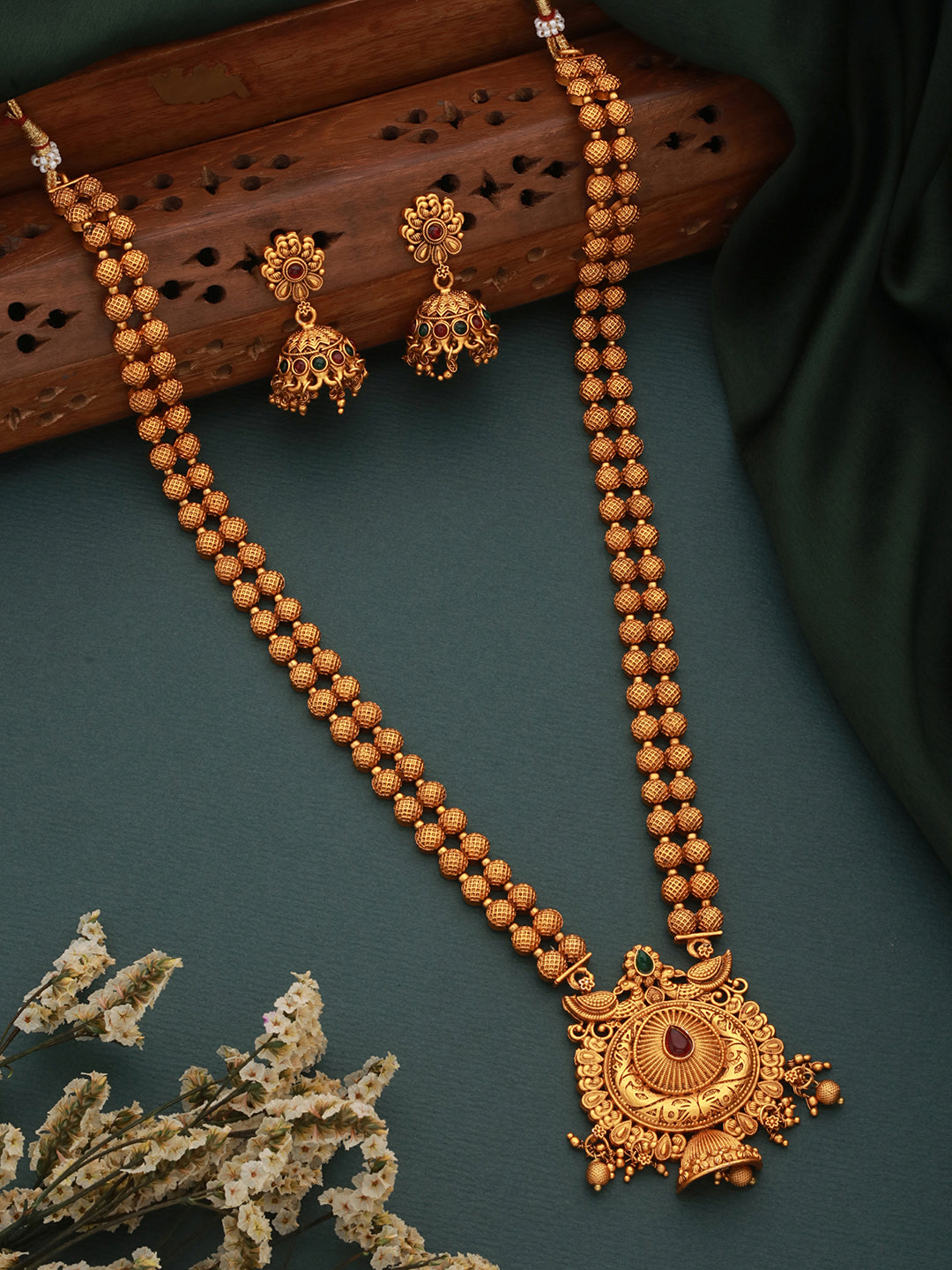 Antique Gold Toned Green Stone Studded Haram Chain Pendant Jewellery Set