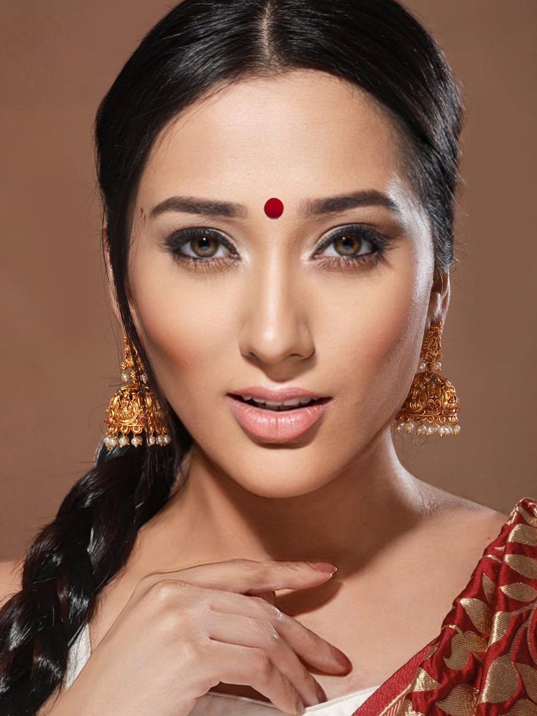 Gold Plated lakshmi Motif Temple Jhumka Earrings