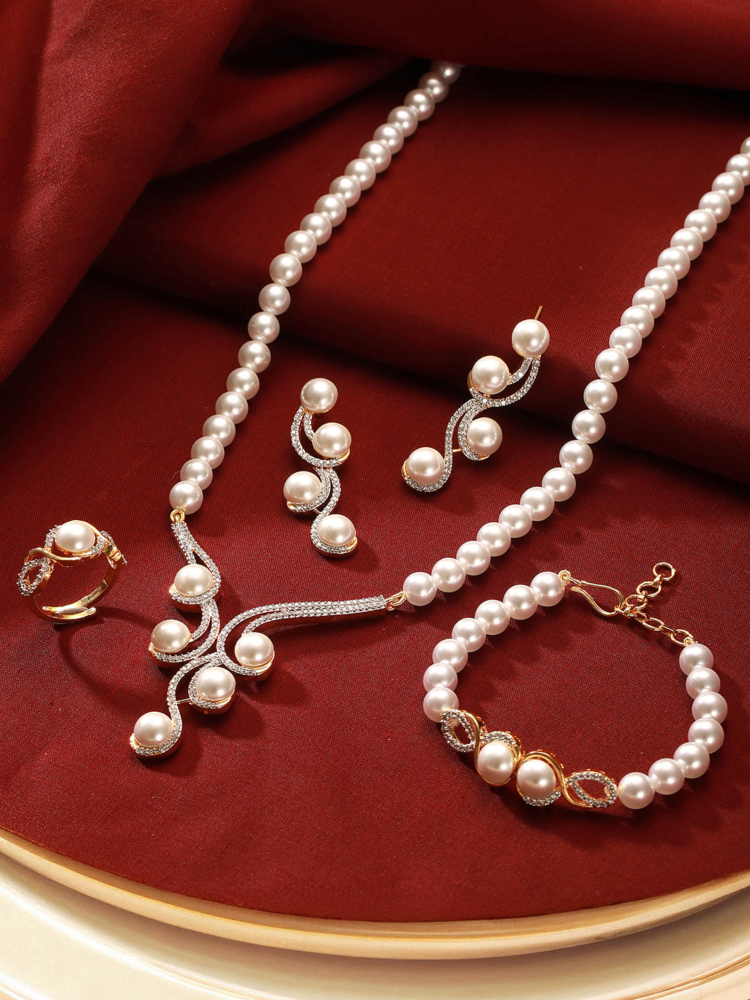Combo Gold Plated White AD & Pearl Studded Floral Minial Ring, Bracelet With Earrings Jewellery Set