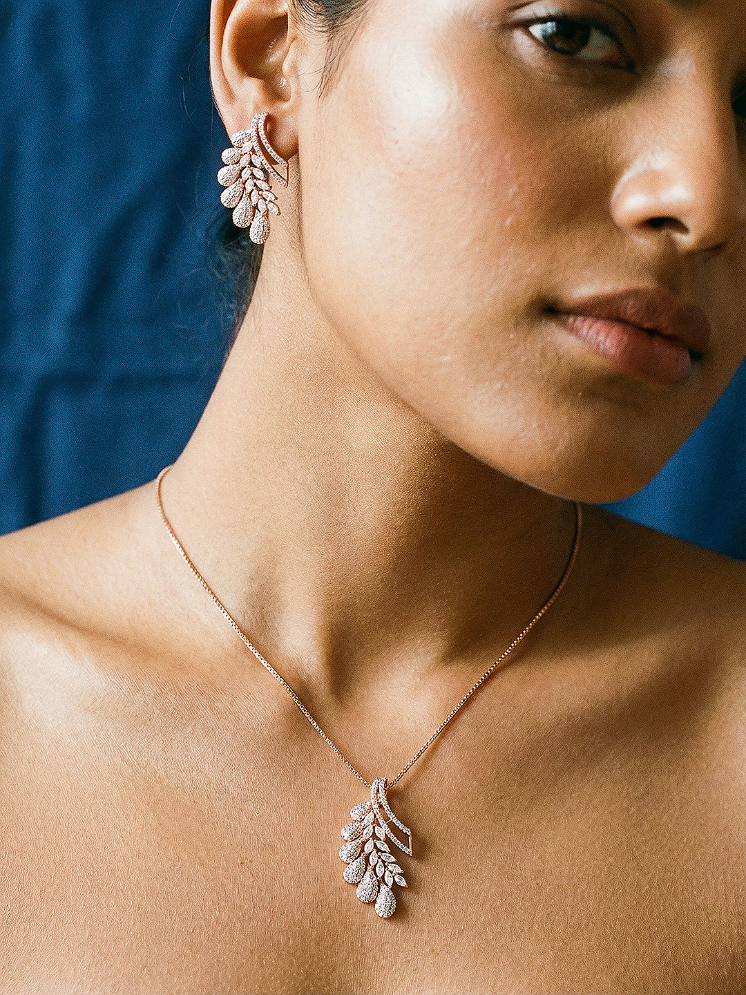 Rose Toned White Zircon Studded Leaf Motif Minimal Pendant Jewellery Set