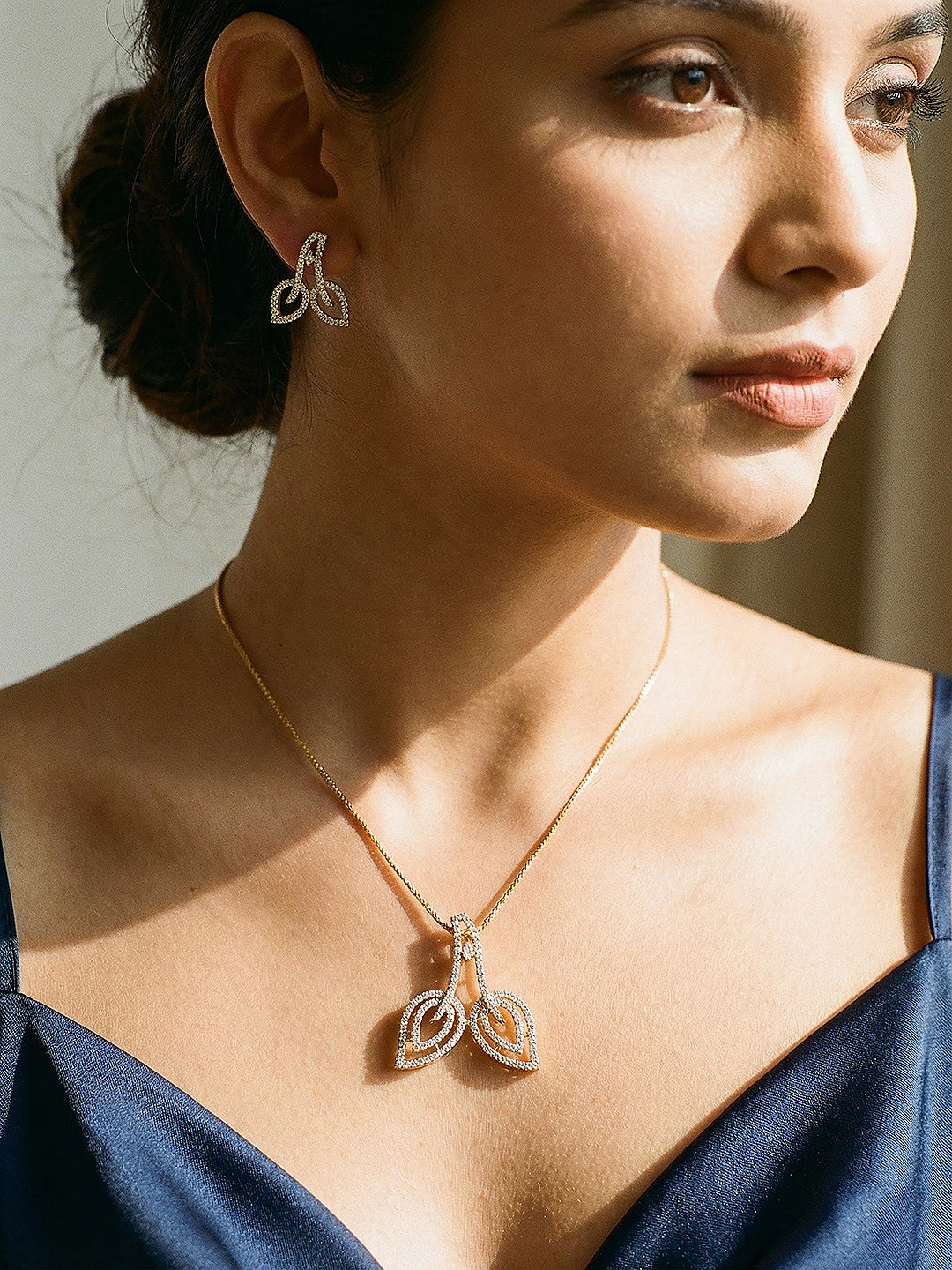 Gold Plated AD Zircon Studded Minimal Leaf Motif Pendant jewellery Set