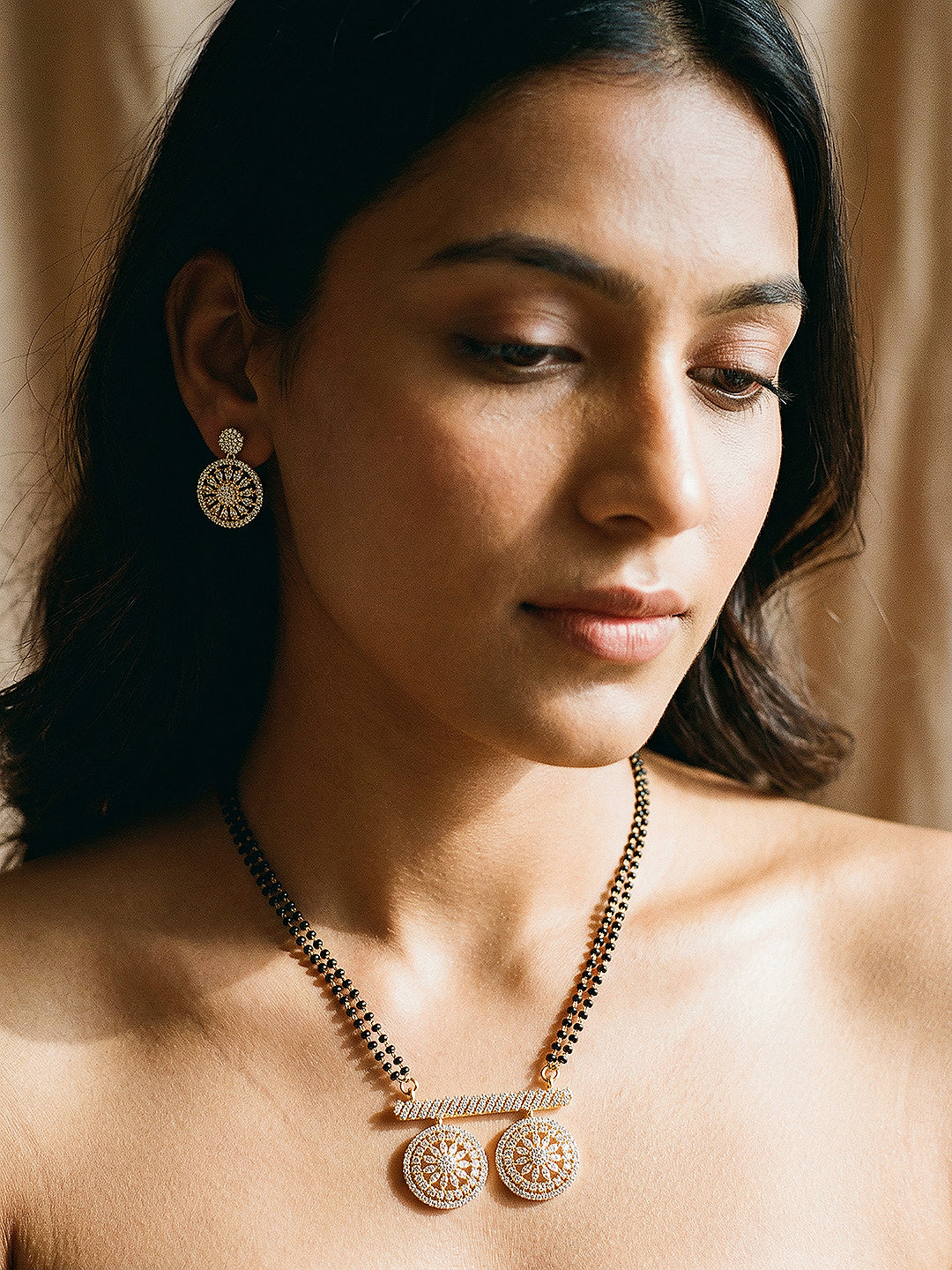 Gold Toned AD Zircon Studded Elegant Handcrafted Mangalsutra Jewellery Set