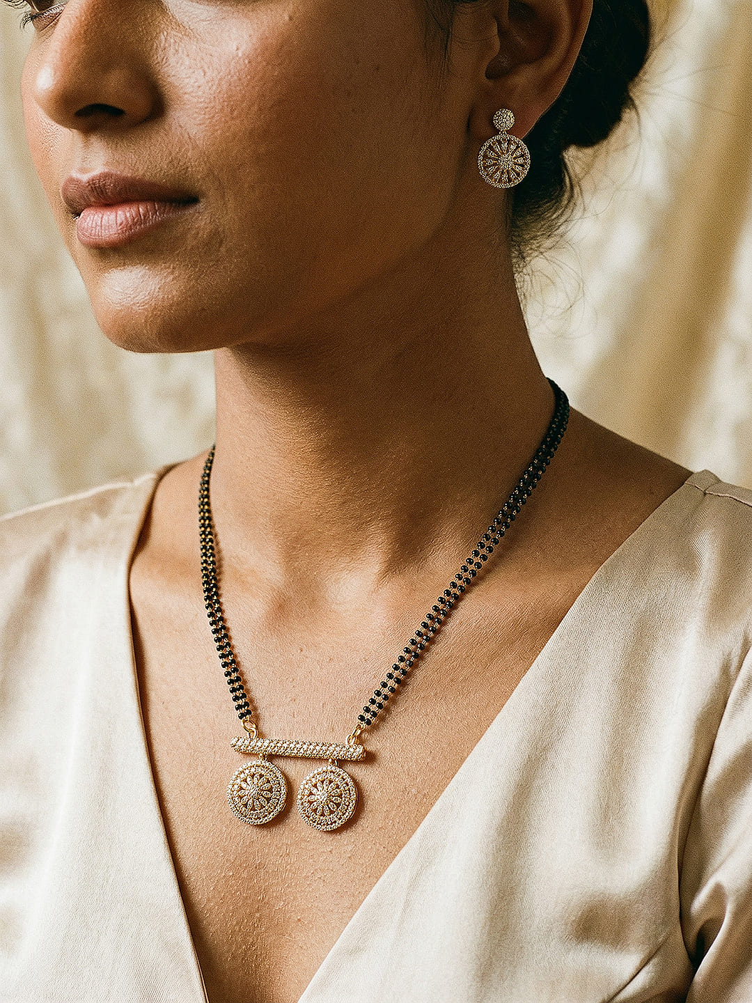 Gold Toned AD Zircon Studded Elegant Handcrafted Mangalsutra Jewellery Set