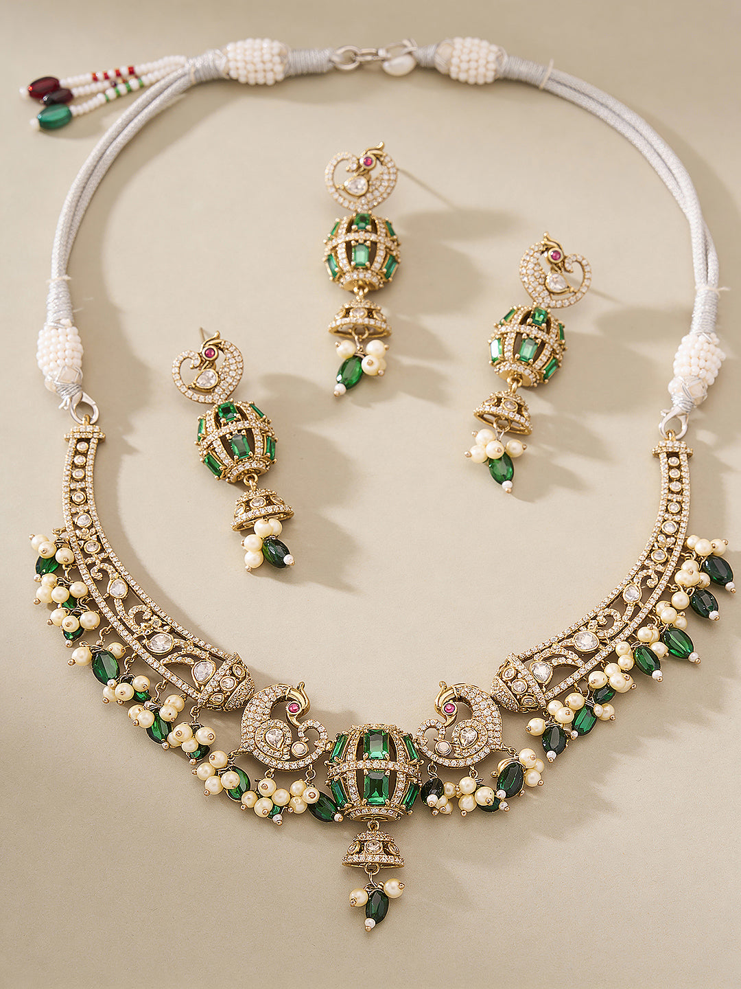 Antique Gold Plated Green Emerald AD  & Kundan Studded Temple Peacock Motif  Choker Jewellery Set