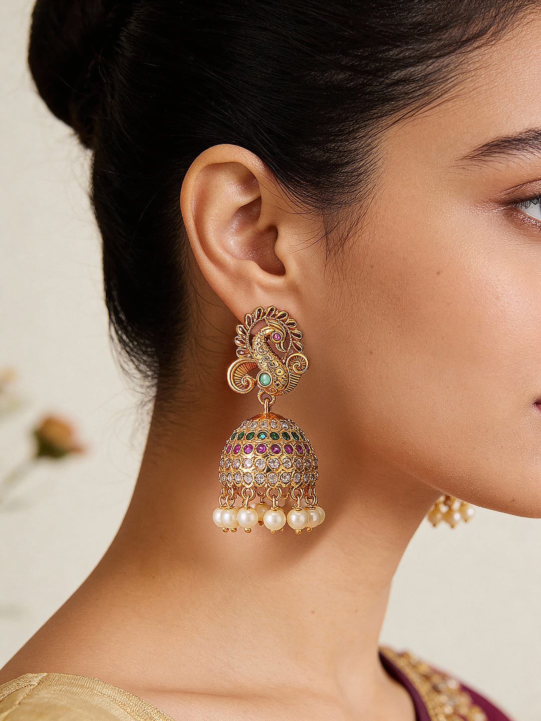 Gold plated Multi Colored AD Studded Peacock Temple Jhumka Earrings