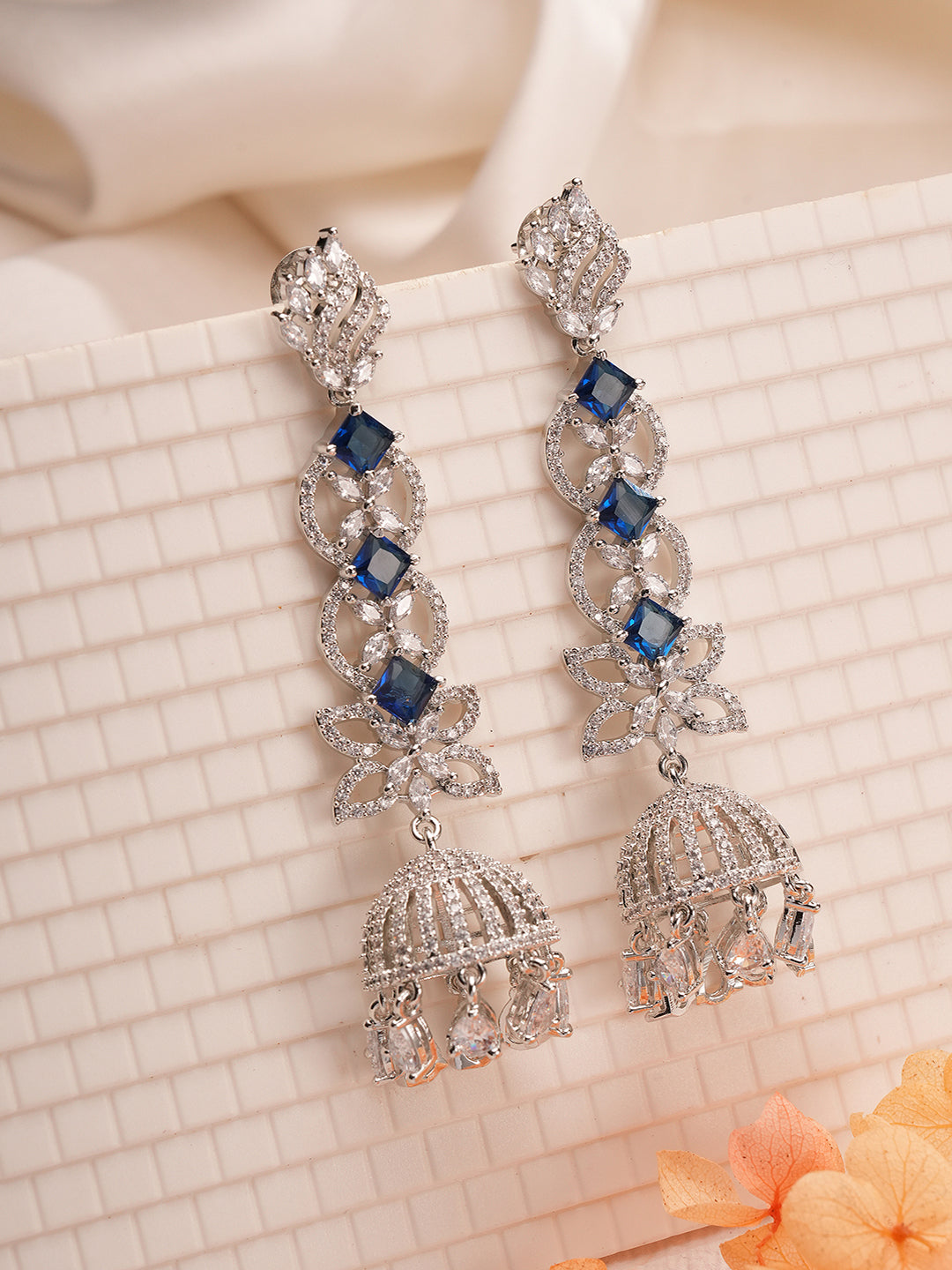 Silver Toned Blue AD Zircon Contemporary Drop Jhumka Earrings