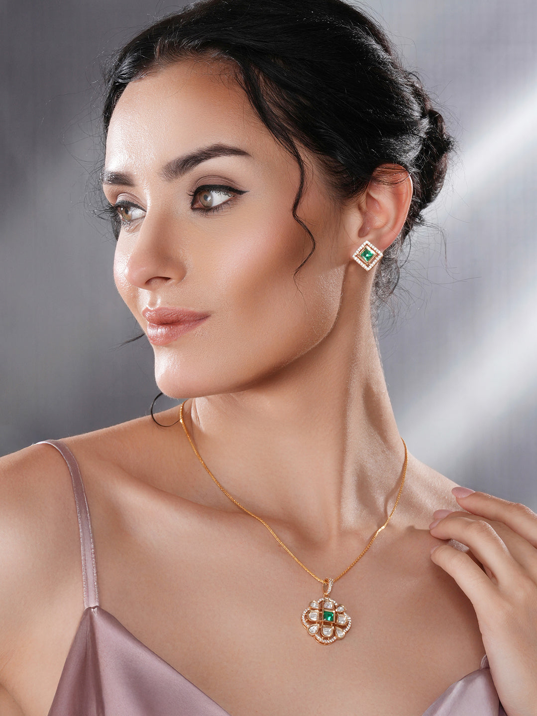 Gold Toned Green Emerald Kundan Studded Designer  Locket Pendant Jewellery Set