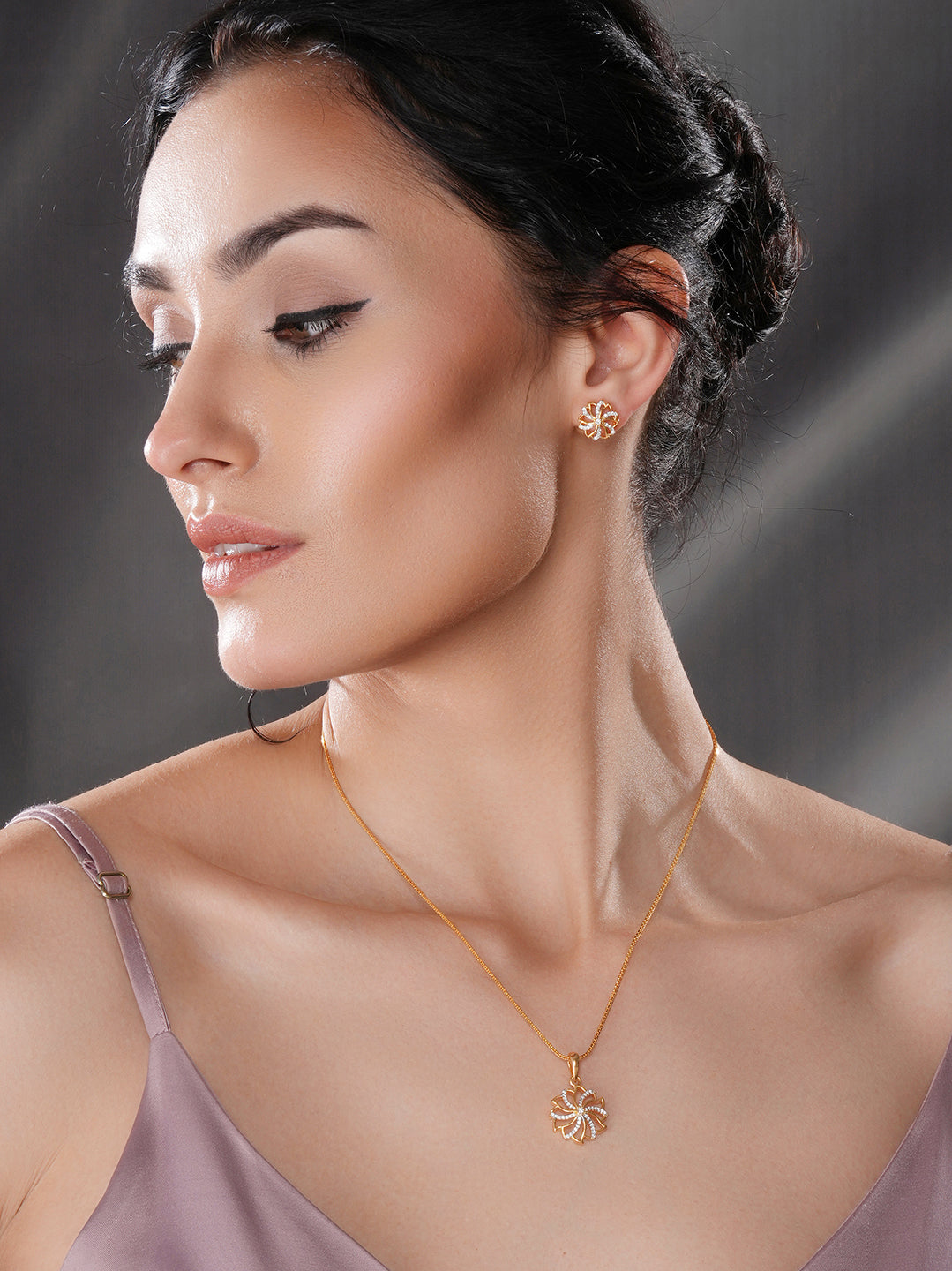 Gold Toned  Cubic Zircon Studded Solar Design Minimal Locket Pendant Jewellery Set