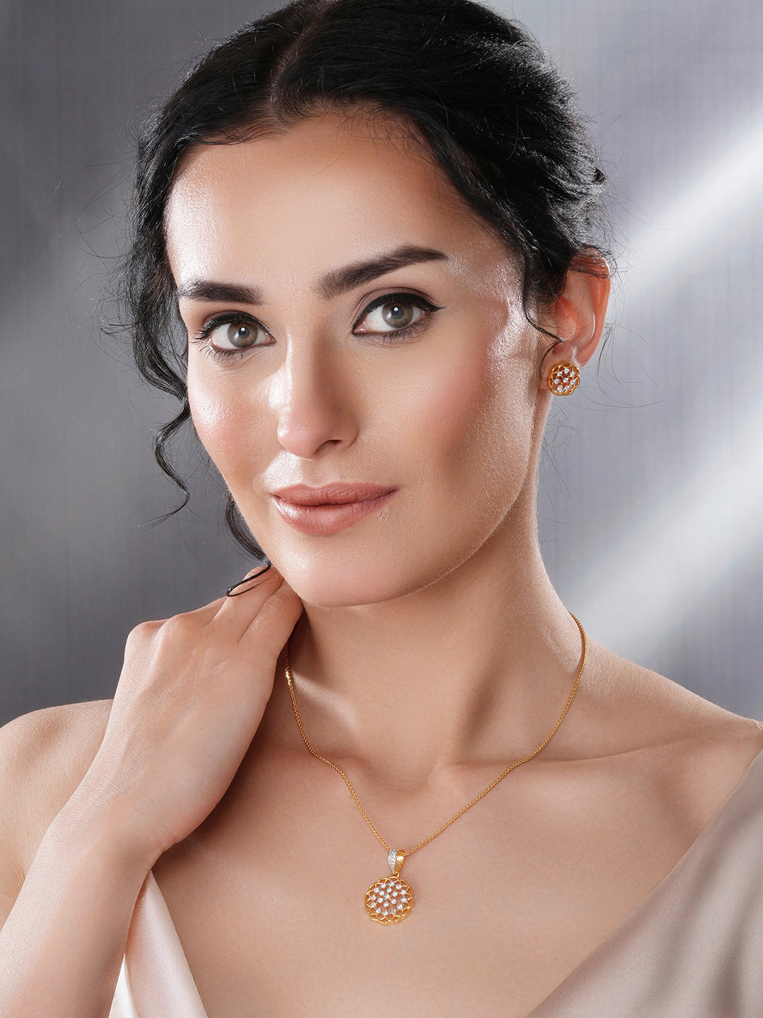 Gold Toned Cubic Zircon Studded Floral  Designer Minimal Locket Pendant Jewellery Set