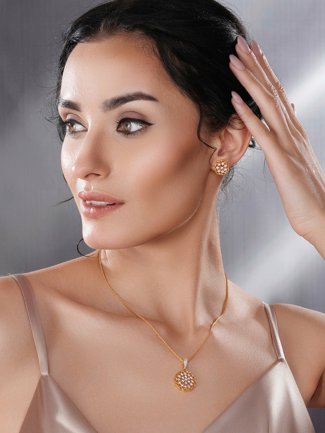 Gold Toned Cubic Zircon Studded Floral  Designer Minimal Locket Pendant Jewellery Set