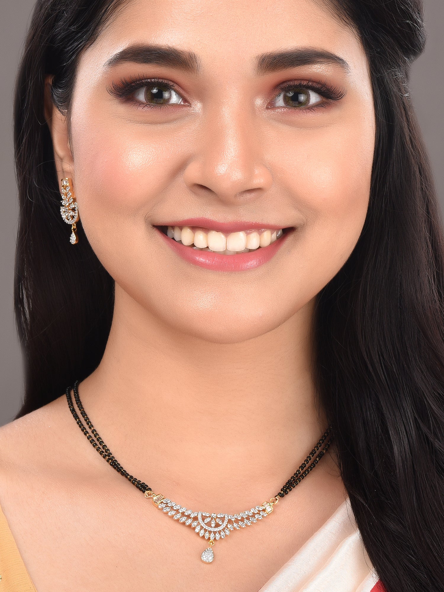 Gold Plated Black & White AD Studded & Beaded Mangalsutra Matching Earrings