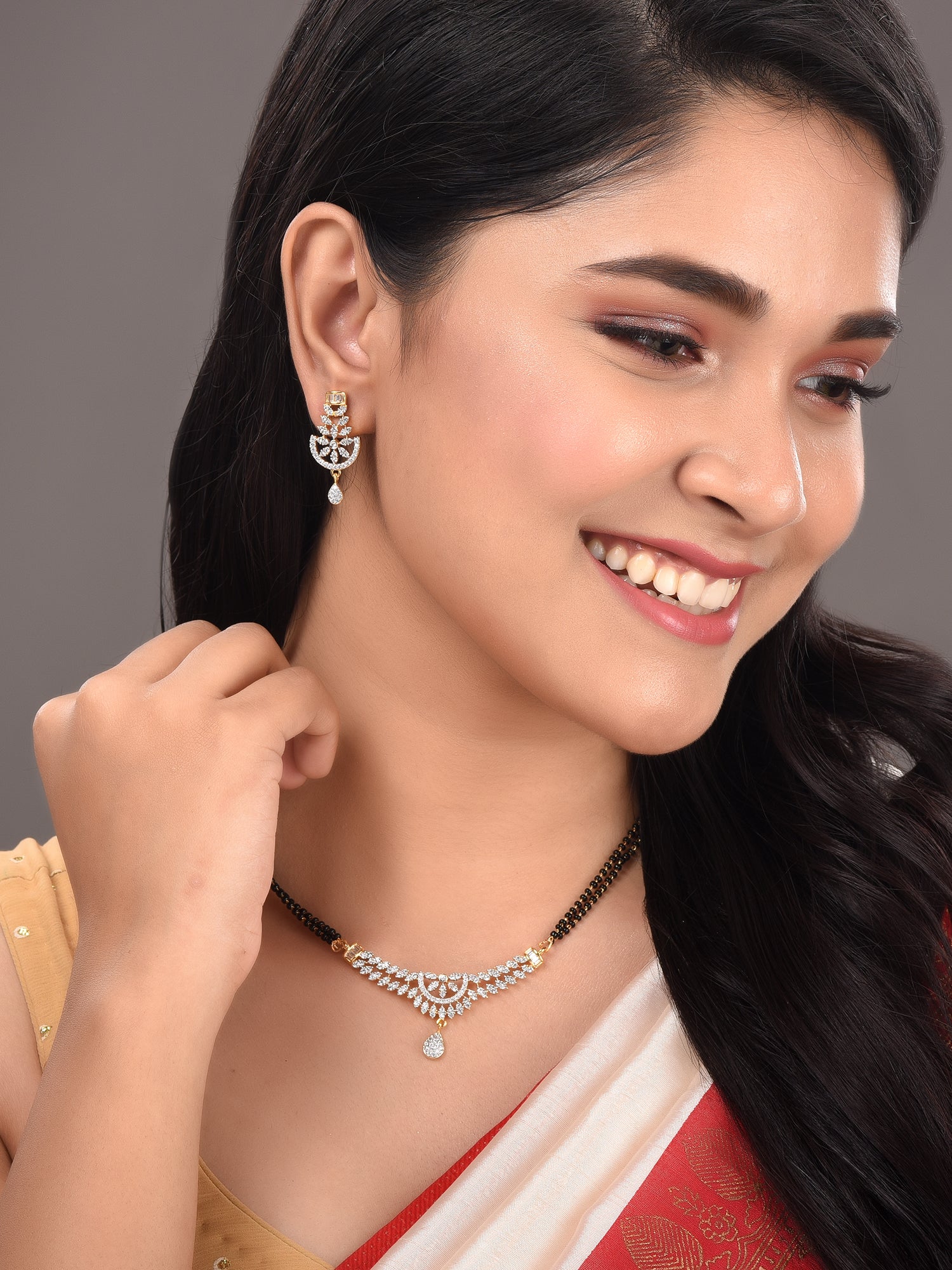 Gold Plated Black & White AD Studded & Beaded Mangalsutra Matching Earrings