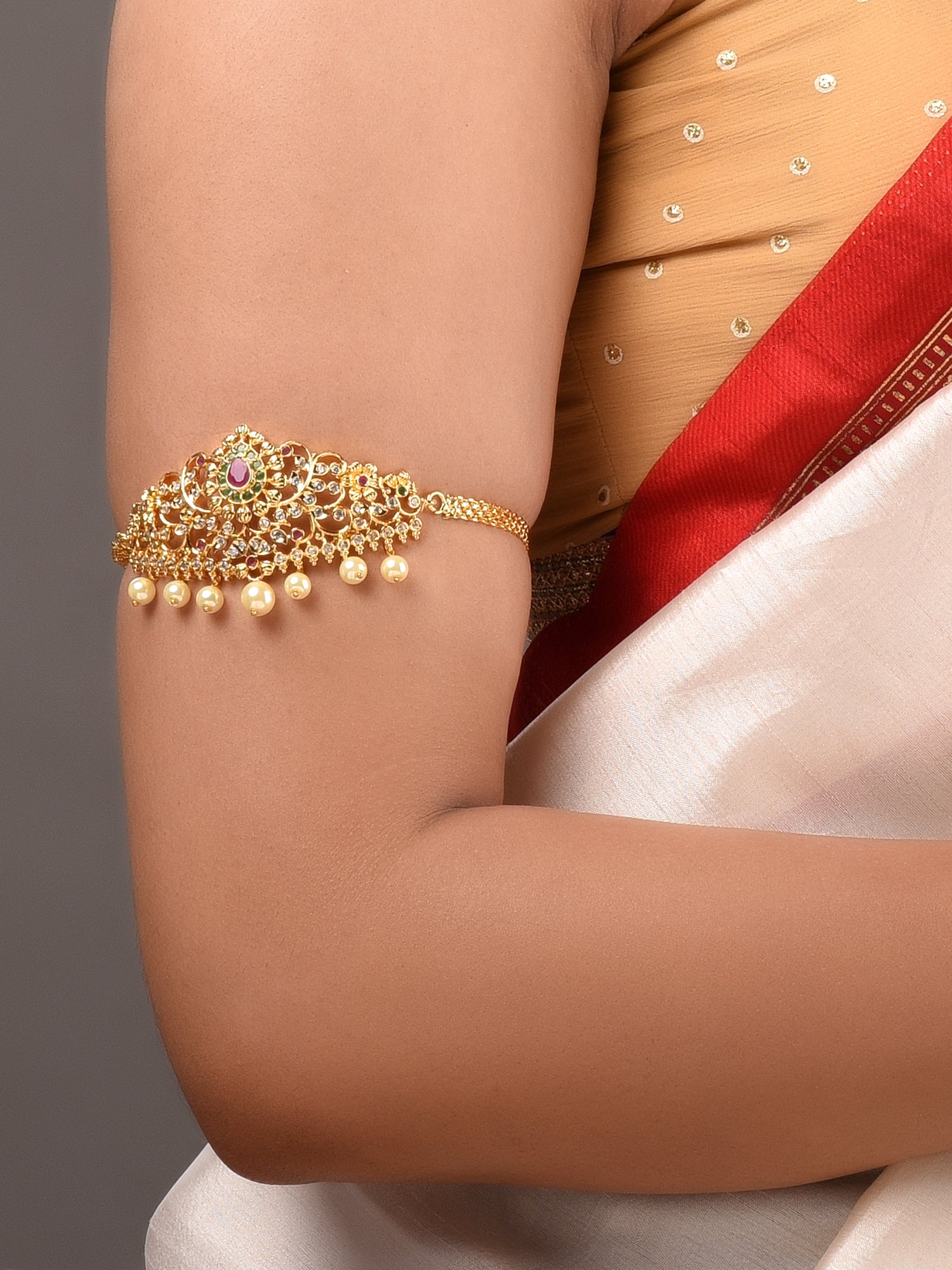 Gold Plated Red AD Studded Pearl Beaded Armlet Bracelet