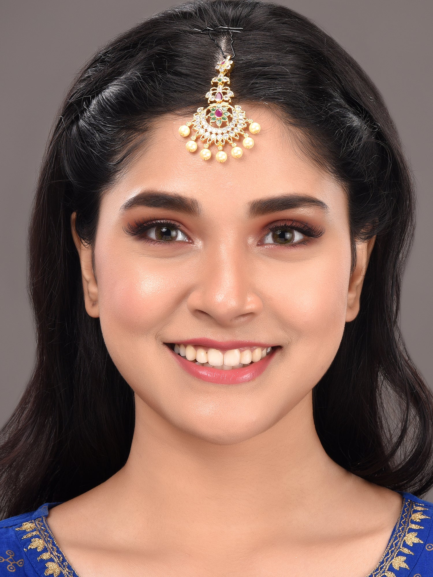 Gold Plated Red & Green AD Studded Pearl Beaded Temple Floral Mangtikka