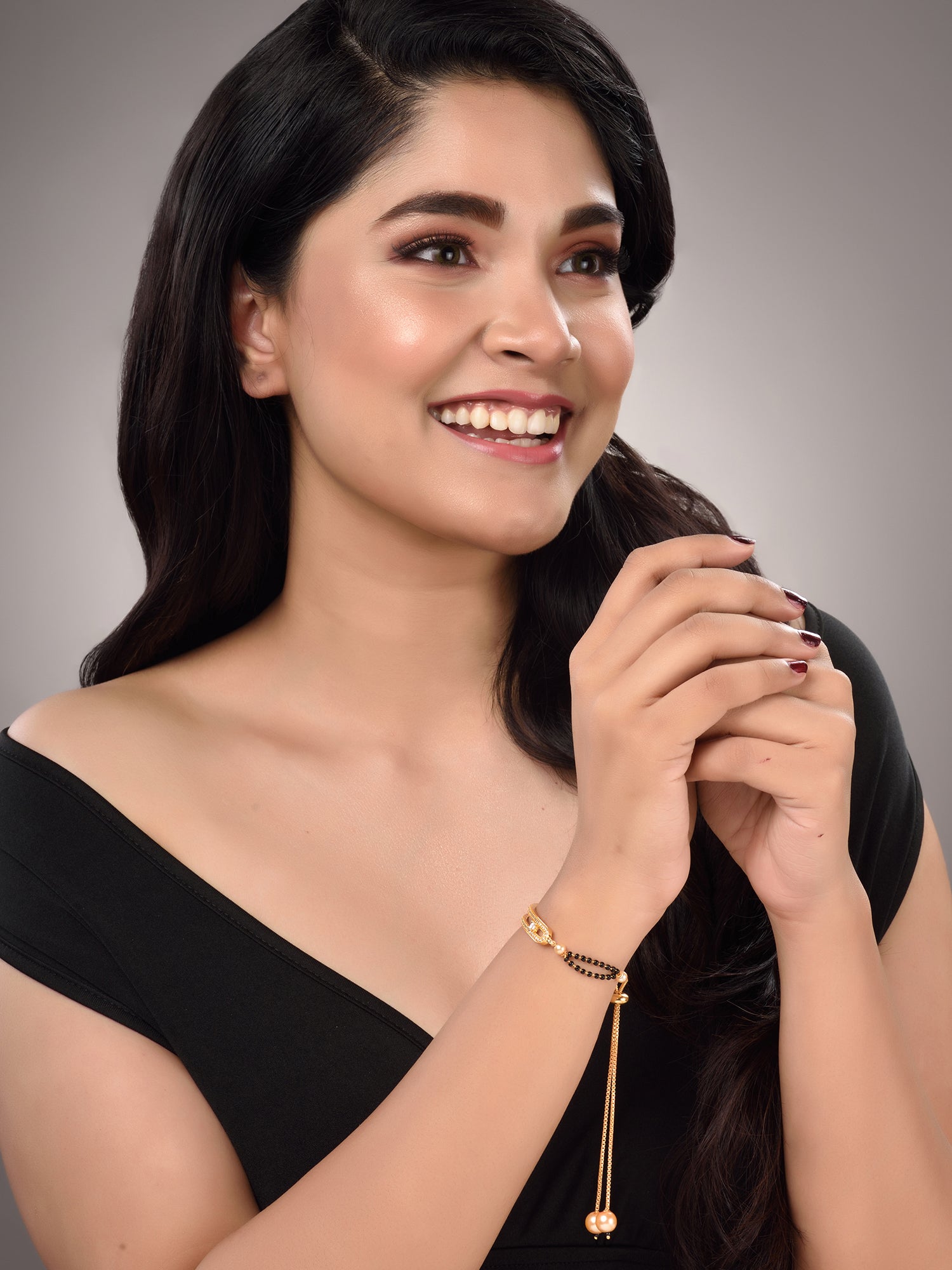 Gold Plated White AD Studded Black Beaded adjustable Mangalsutra Bracelet