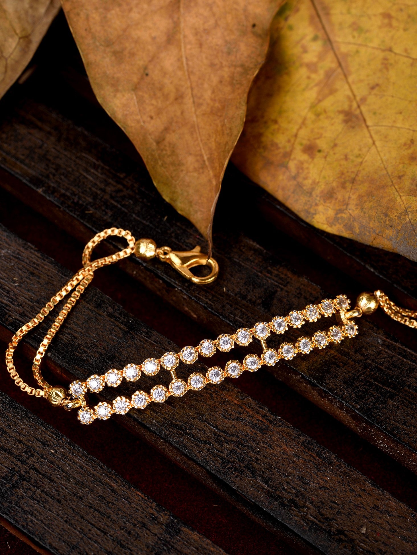 Gold Toned & White AD Studded Wraparound Adjustable Bracelet