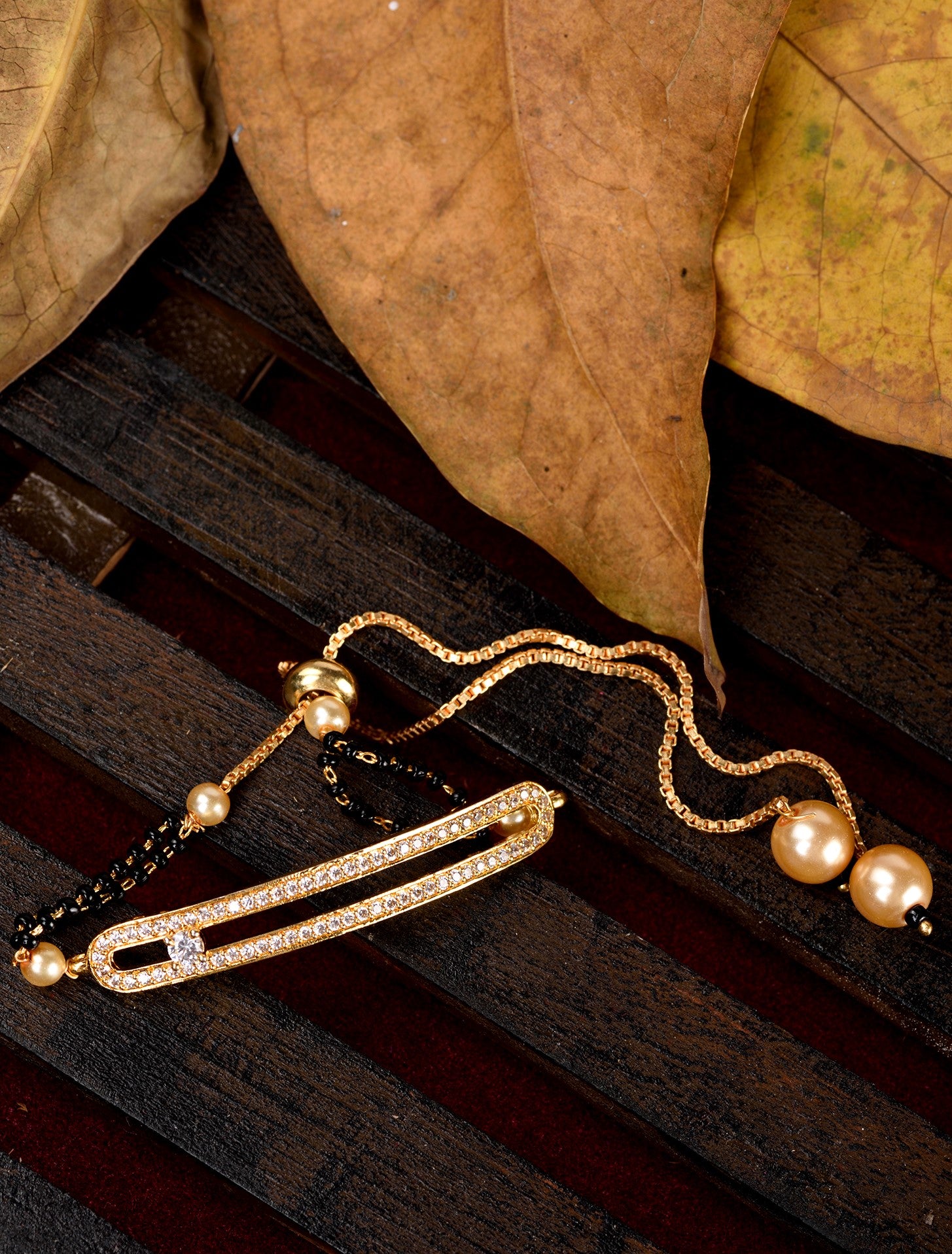 Gold Plated White AD Studded Black Beaded adjustable Mangalsutra Bracelet