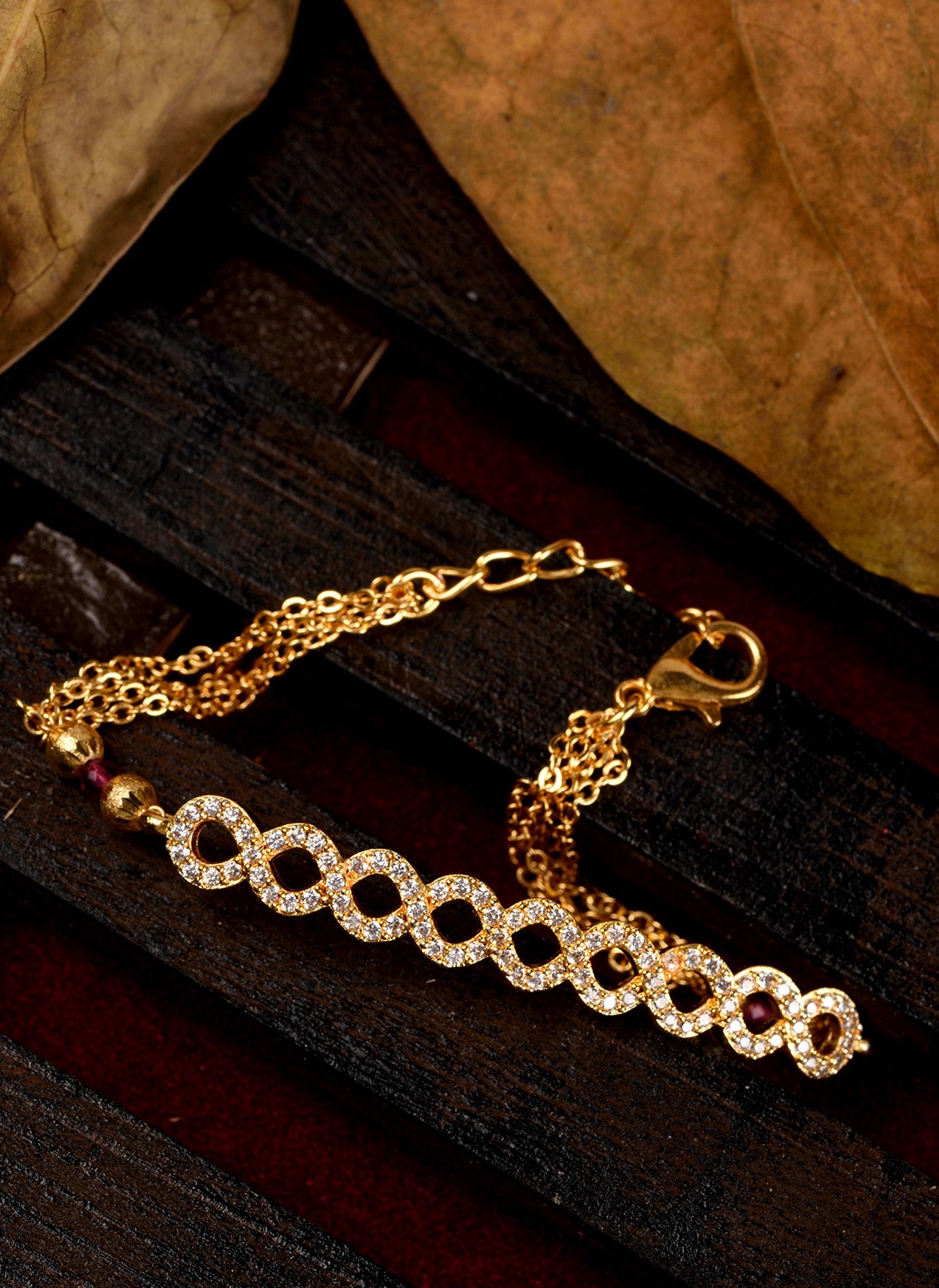 Gold Toned White AD Studded Contemporary Wraparound Bracelet