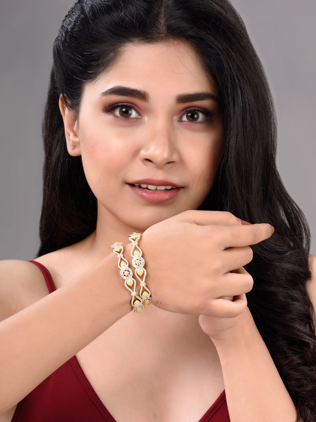 Set Of 2 Dua Toned Gold Plated Whitee AD Studded Handcrafted Leafy Design Bangles