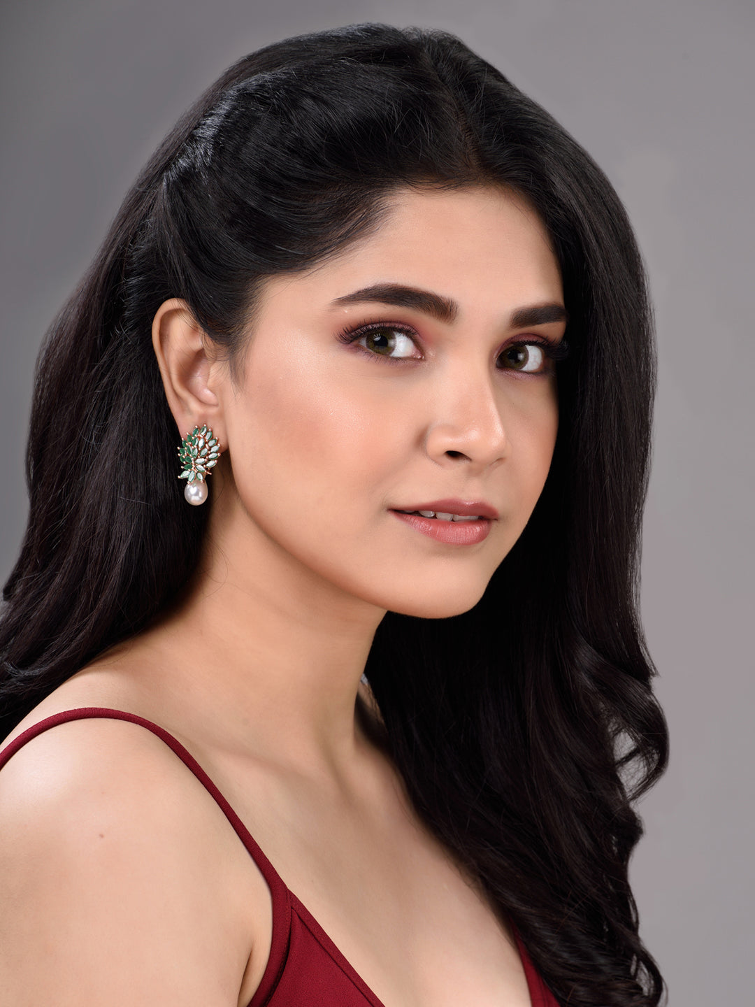 Rose Gold Plated Green AD Studded Luxourios Pearl Drop Earrings