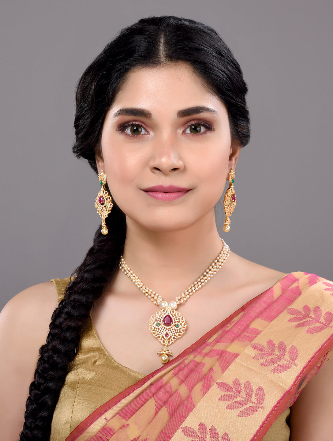 Gold Plated AD and Pearl Studded Traditional Pendant White Pearl Mala and Earrings