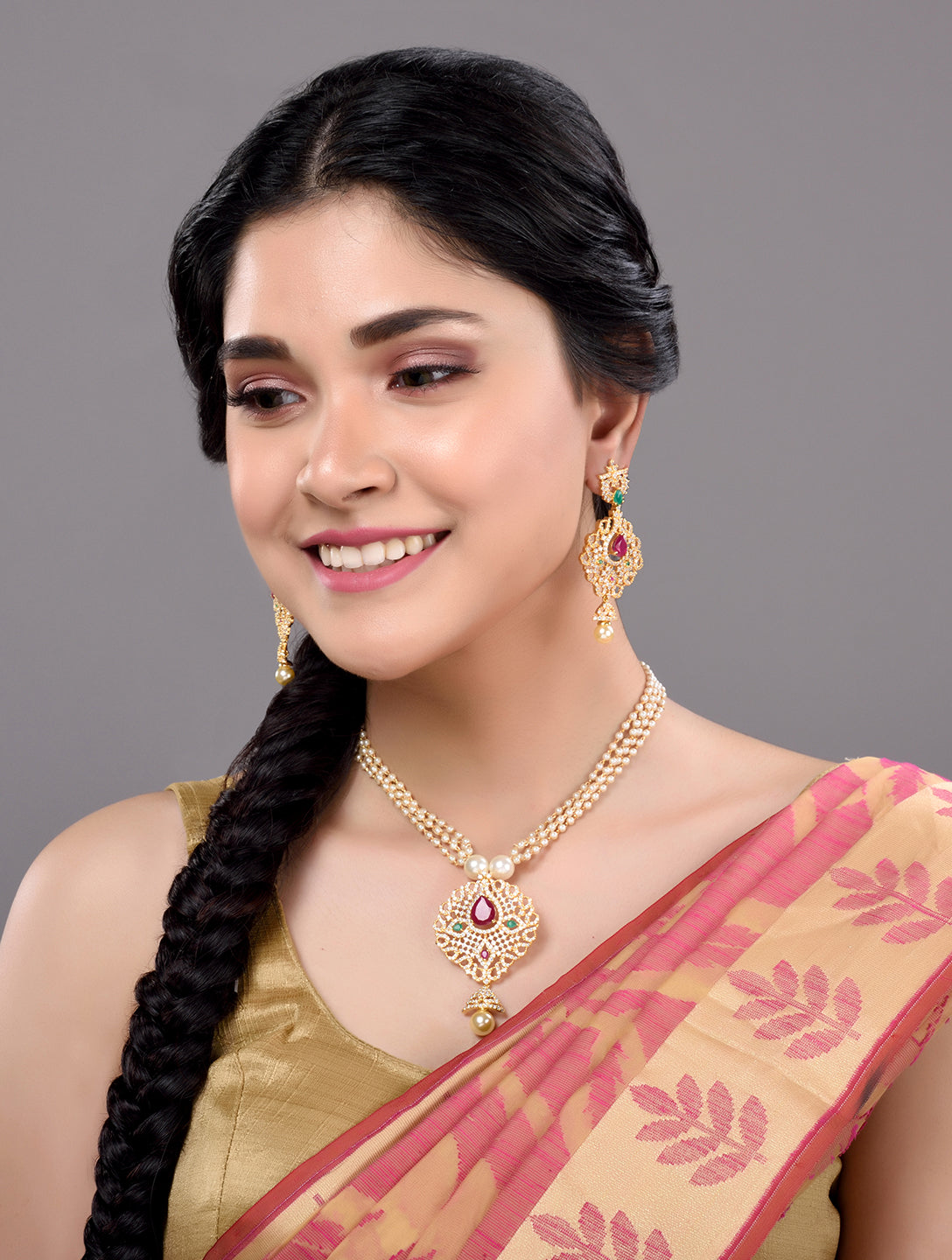 Gold Plated AD and Pearl Studded Traditional Pendant White Pearl Mala and Earrings