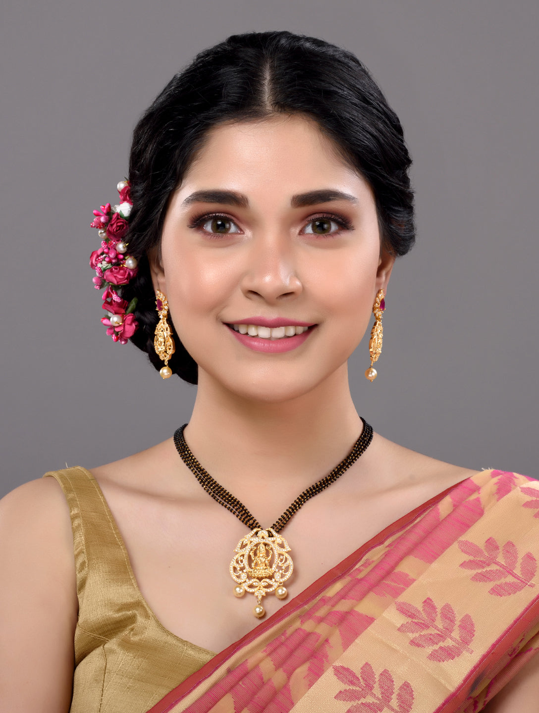 Gold Plated AD Studded Antique Temple Pendant Black Beads mala and Earrings Set