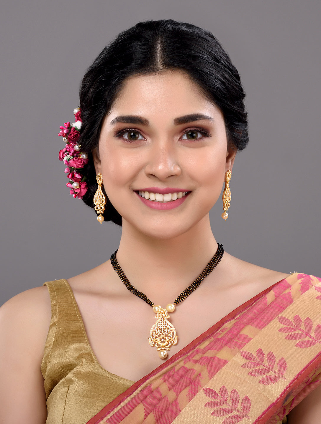 Gold Plated White AD and Pearl studded Antique Pendant Necklace Black Beads Pearl Mala and Earrings