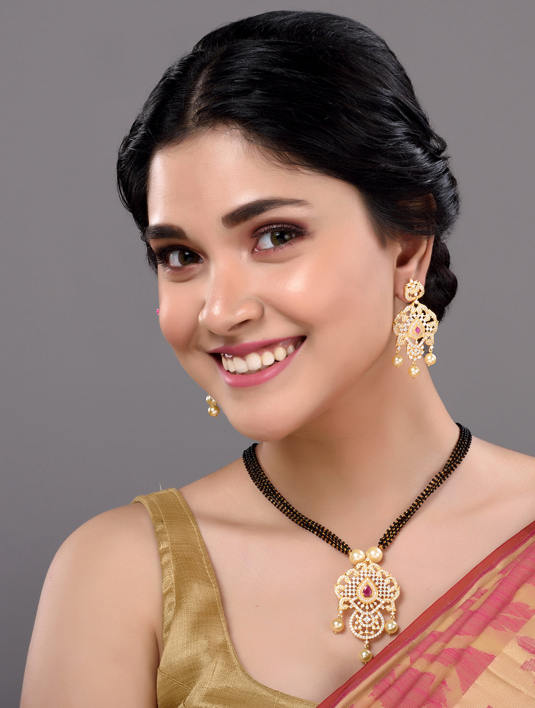 Gold Plated Red AD Studded Traditional Intricate Pendant Necklace Black beads Mala and Earrings