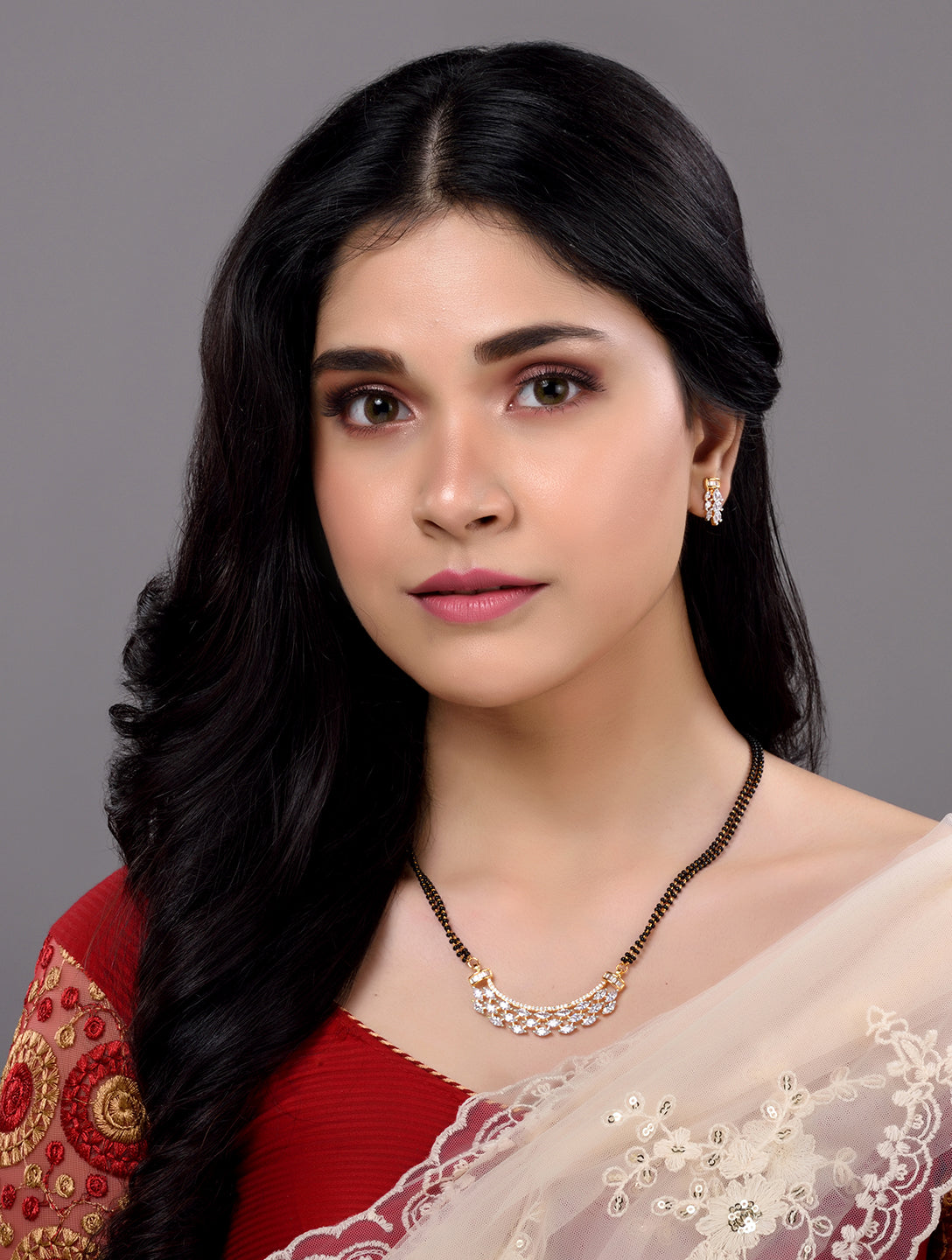 Gold Plated Black beads AD Studded Contemporary Mangalsutra Pendant and Earrings Set