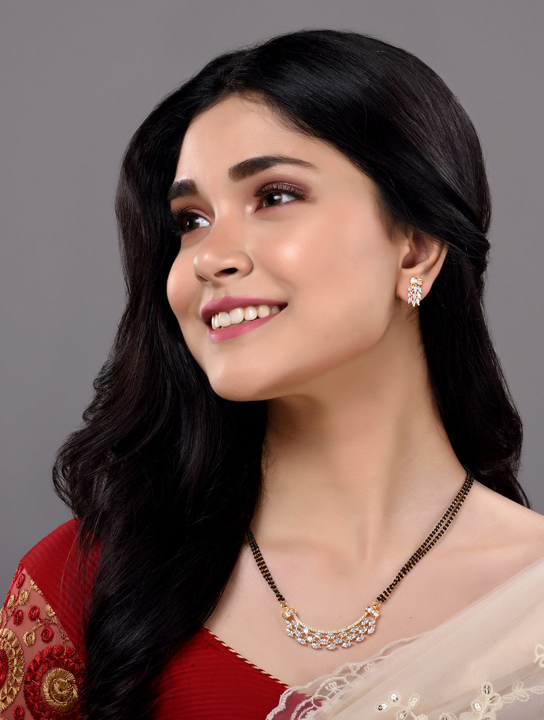 Gold Plated Black beads AD Studded Contemporary Mangalsutra Pendant and Earrings Set