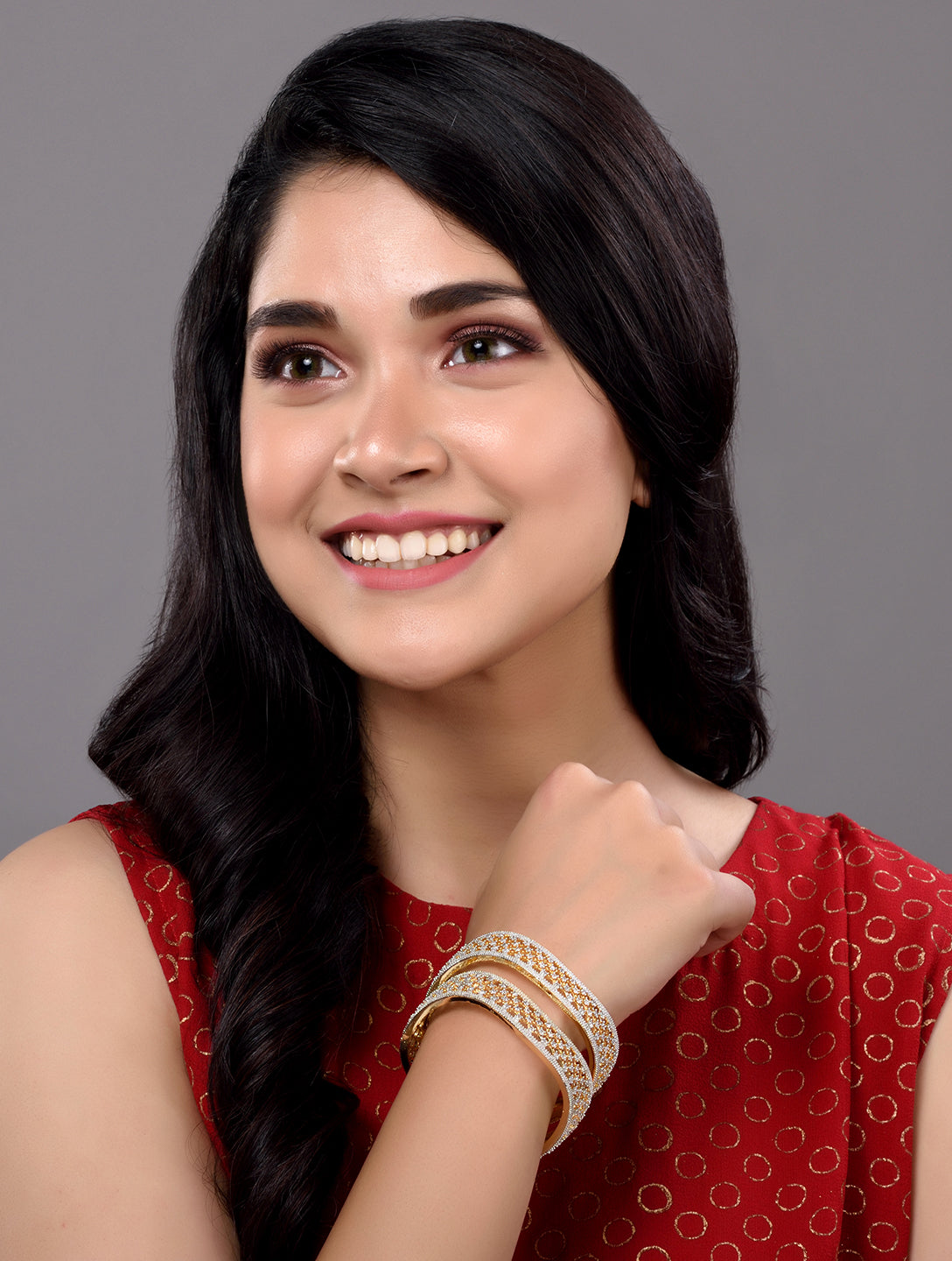 Set Of 2 Gold Plated  AD Studded Cut -Out Hand Crafted Bracelet Bangles