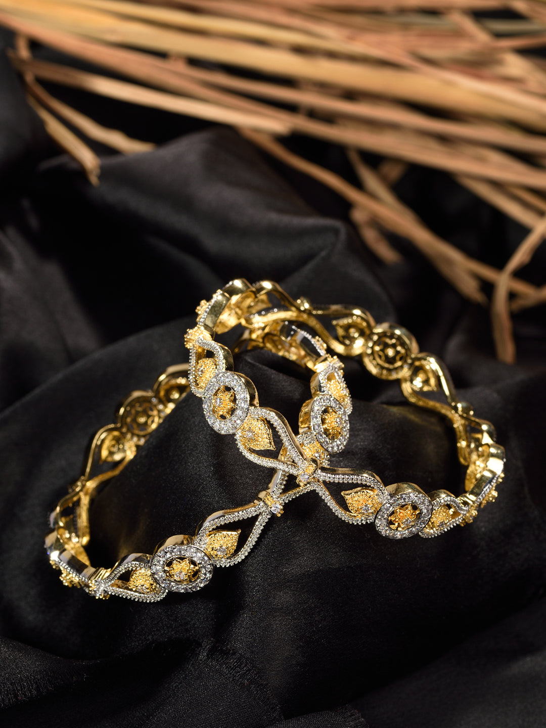 Set Of 2 Dua Toned Gold Plated Whitee AD Studded Handcrafted Leafy Design Bangles