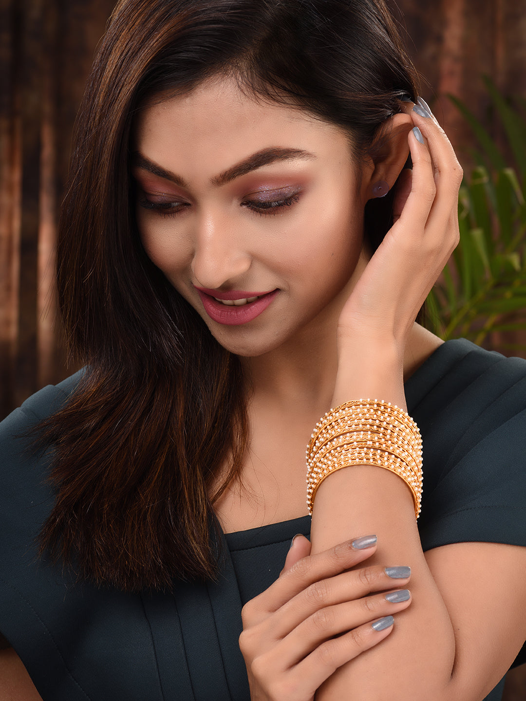 Set Of 12 Gold Plated & Pearl Studded Bangles