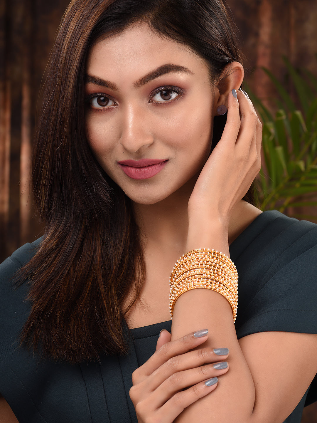 Set Of 12 Gold Plated & Pearl Studded Bangles