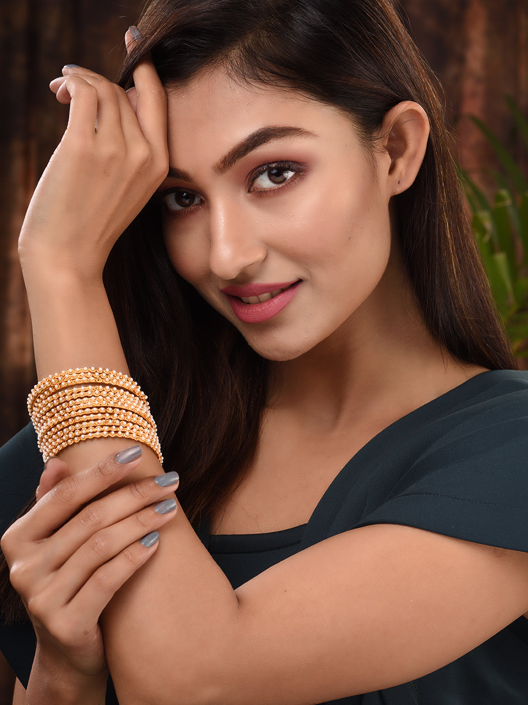 Set Of 12 Gold Plated & Pearl Studded Bangles