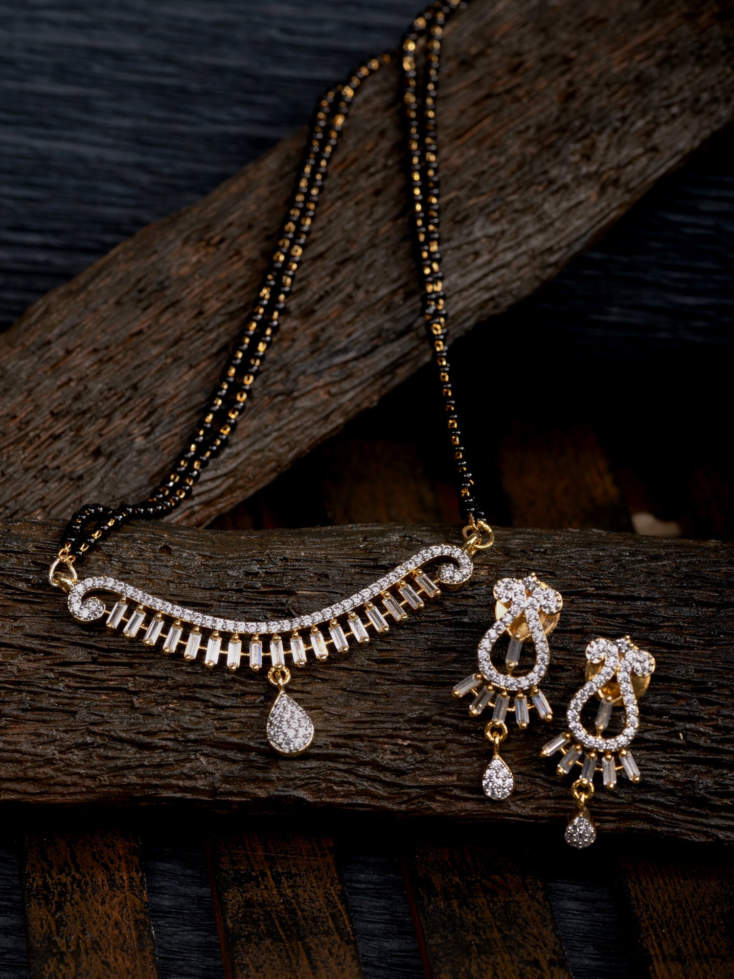 Gold Plated Black & White AD Studded & Beaded Mangalsutra Earrings